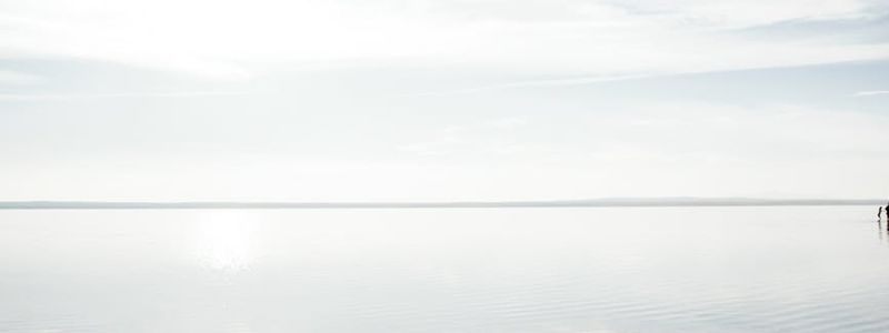 A panoramic view of a simple, clean workout space.